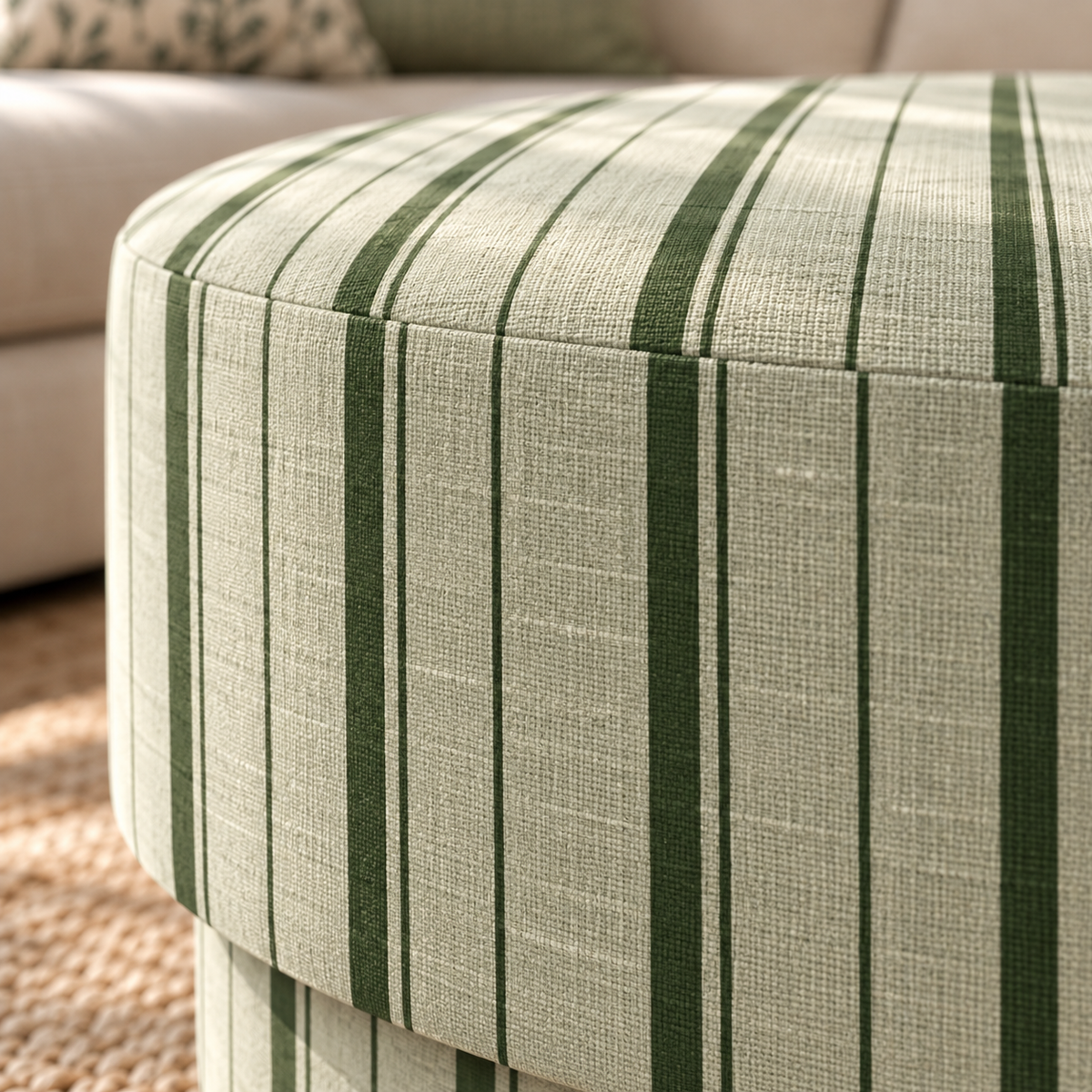 The Adelaide Ottoman in The Silk Garden Sage Stripes