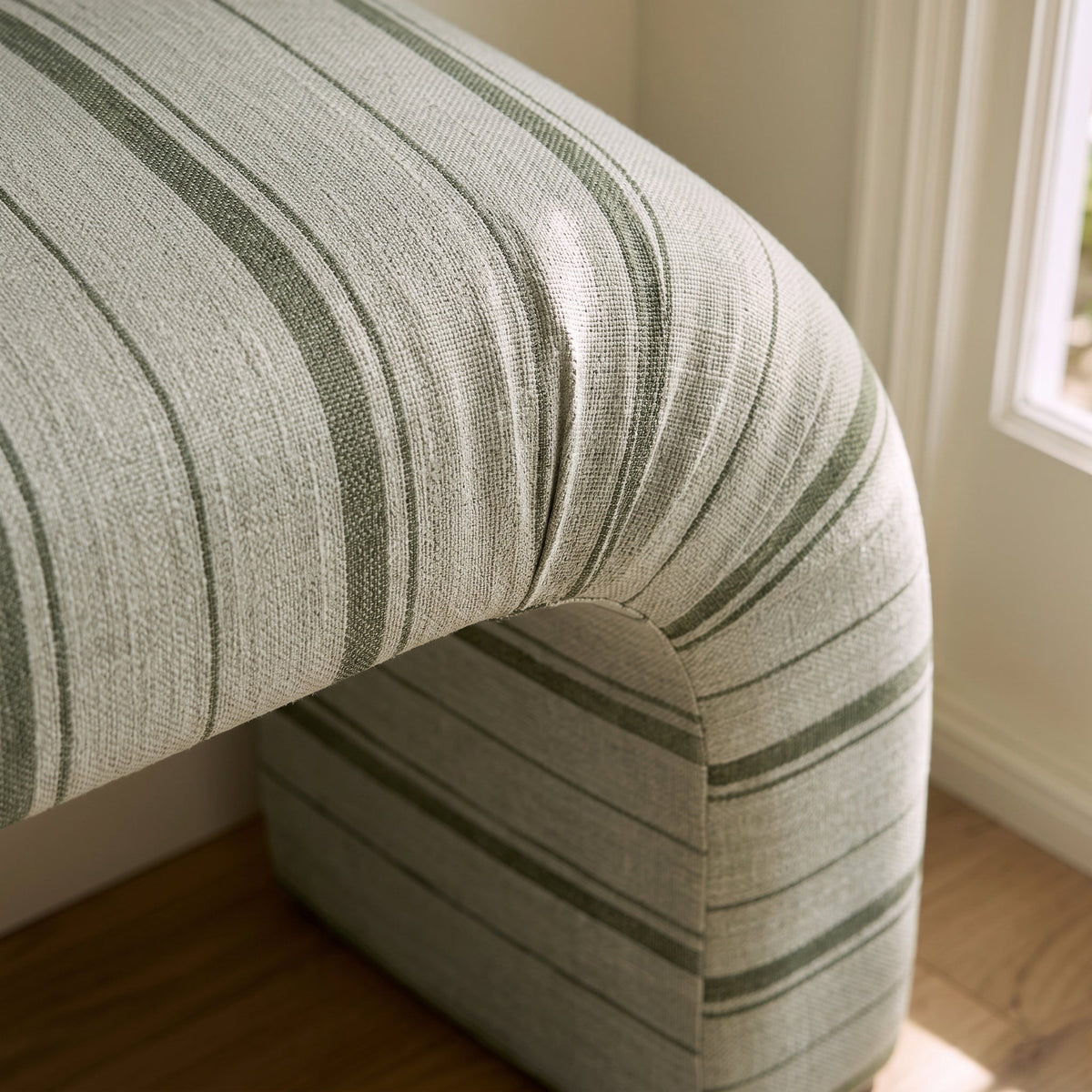 The Lewis Ottoman in The Silk Garden Sage Stripes