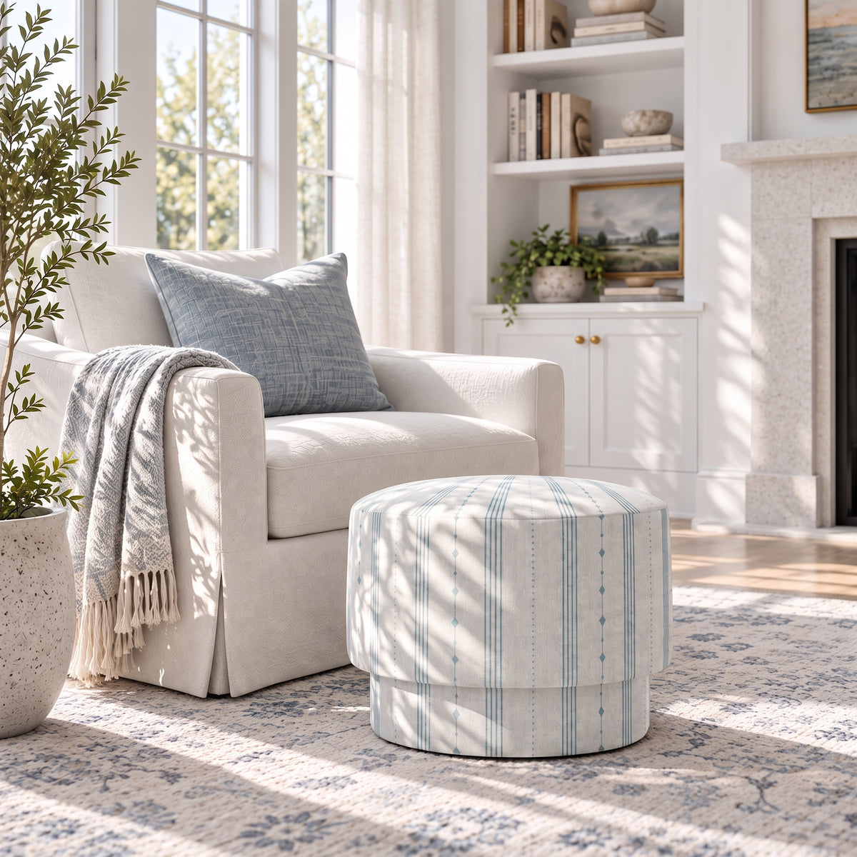 The Adelaide Ottoman in Pearl's Haven Spring Blue Stripes