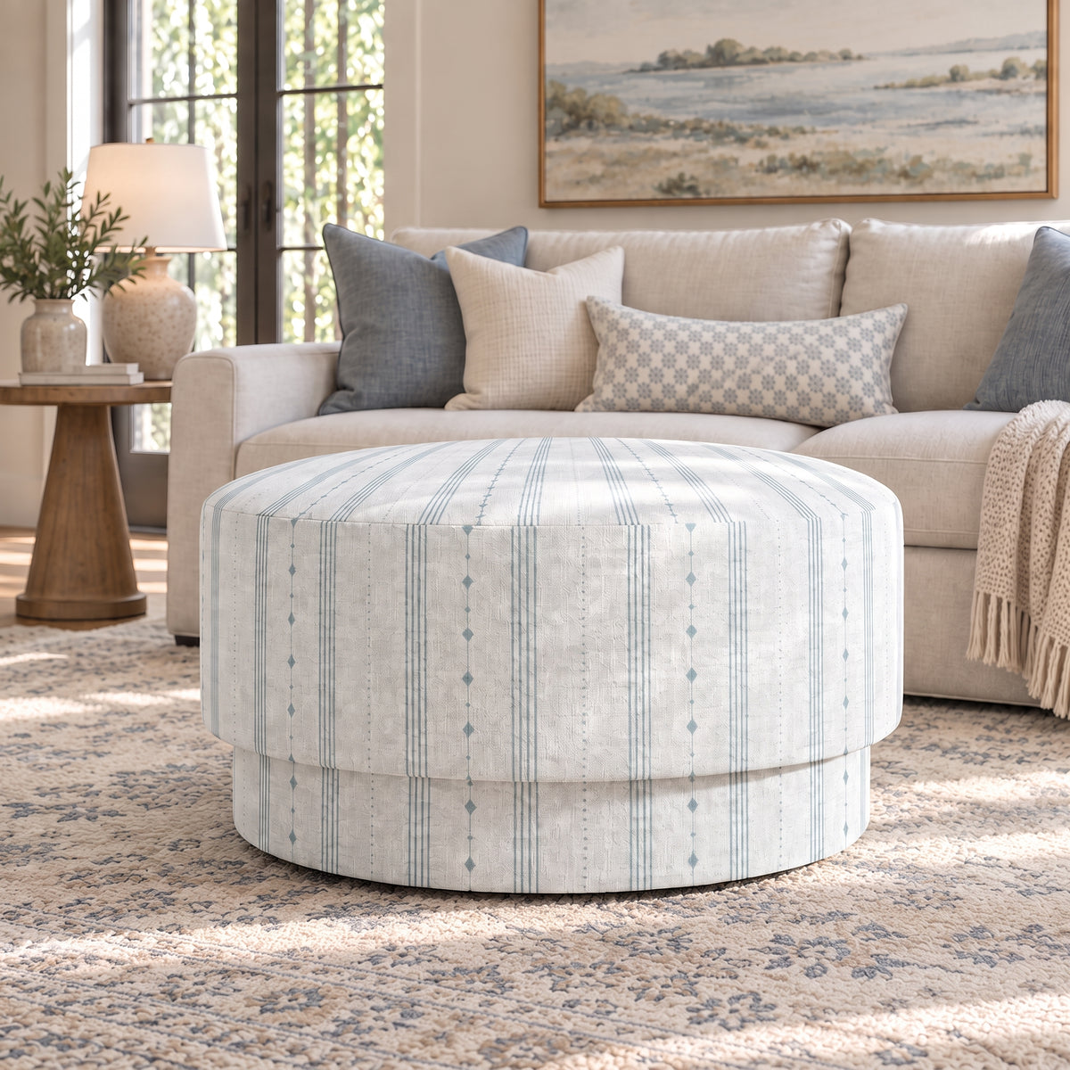The Adelaide Ottoman in Pearl's Haven Spring Blue Stripes