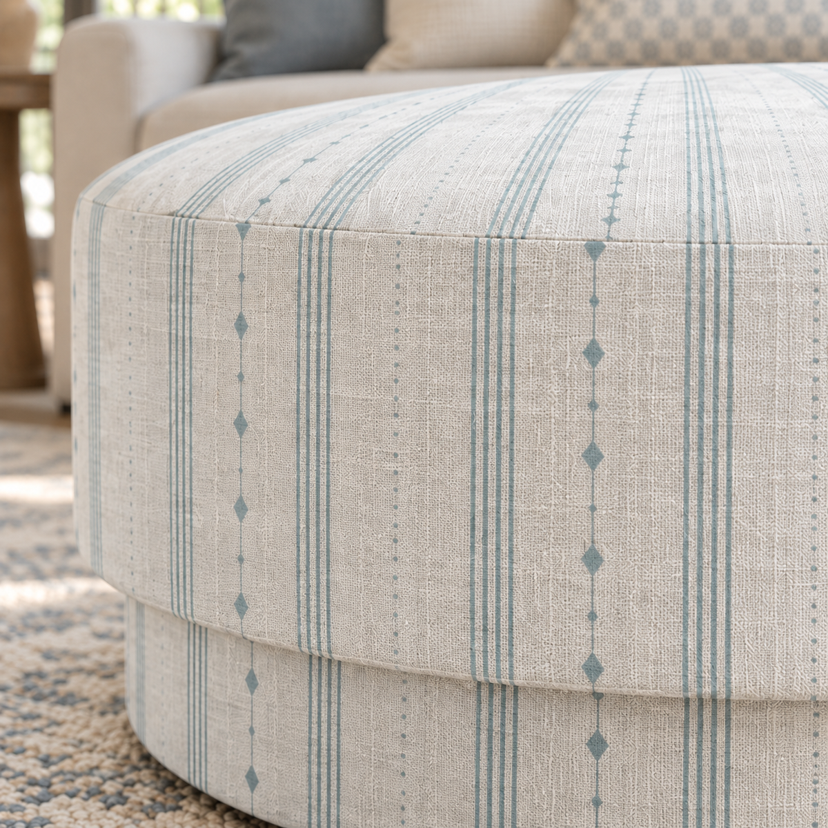 The Adelaide Ottoman in Pearl's Haven Spring Blue Stripes