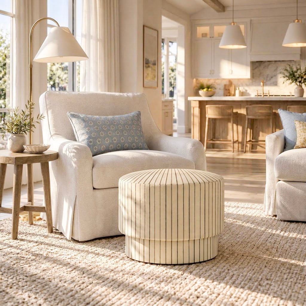 The Adelaide Ottoman in Jude Pinstripe
