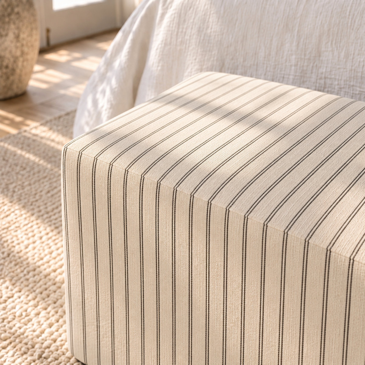 The Josephine Ottoman in Jude Pinstripe