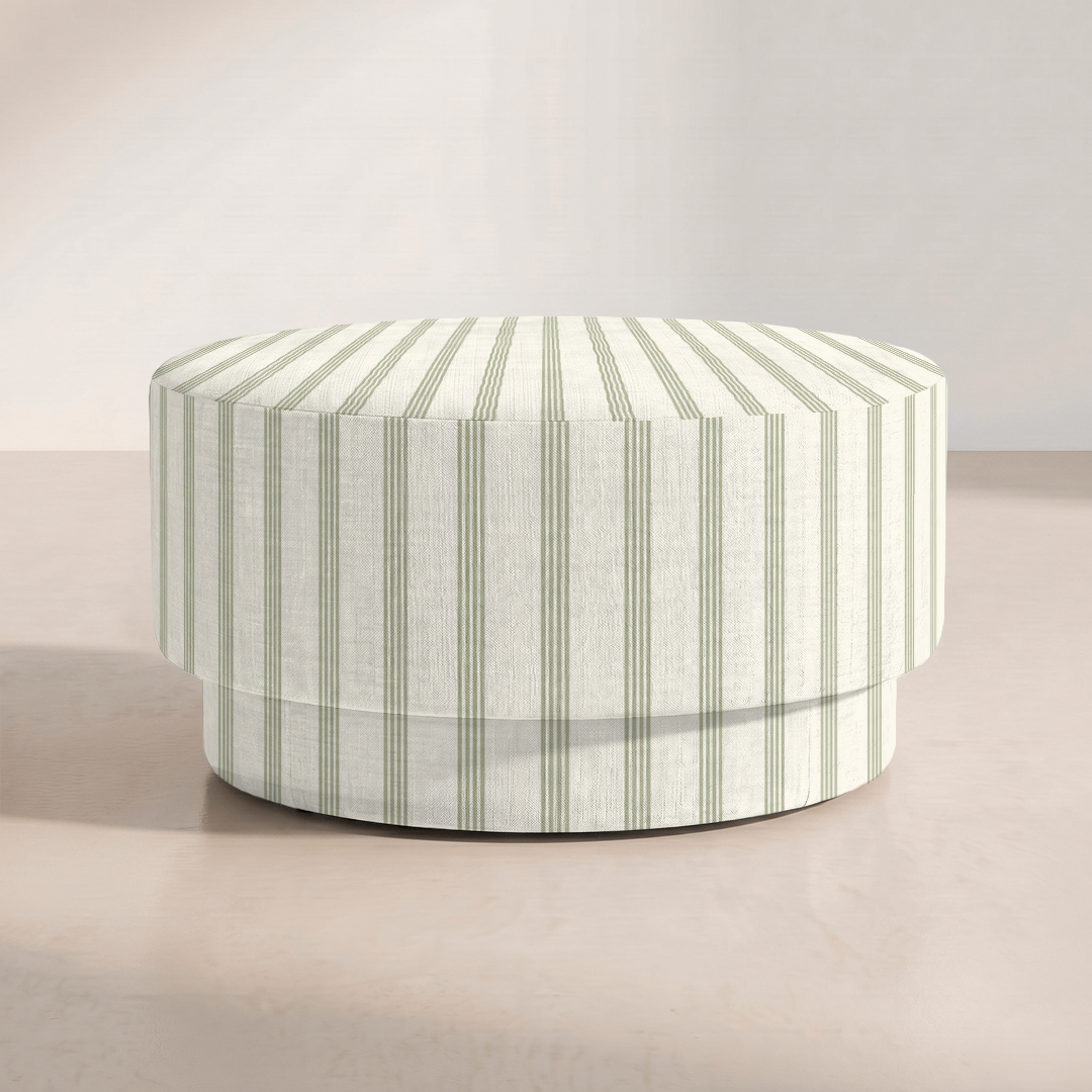 The Adelaide Ottoman in Orange County Olive Stripes