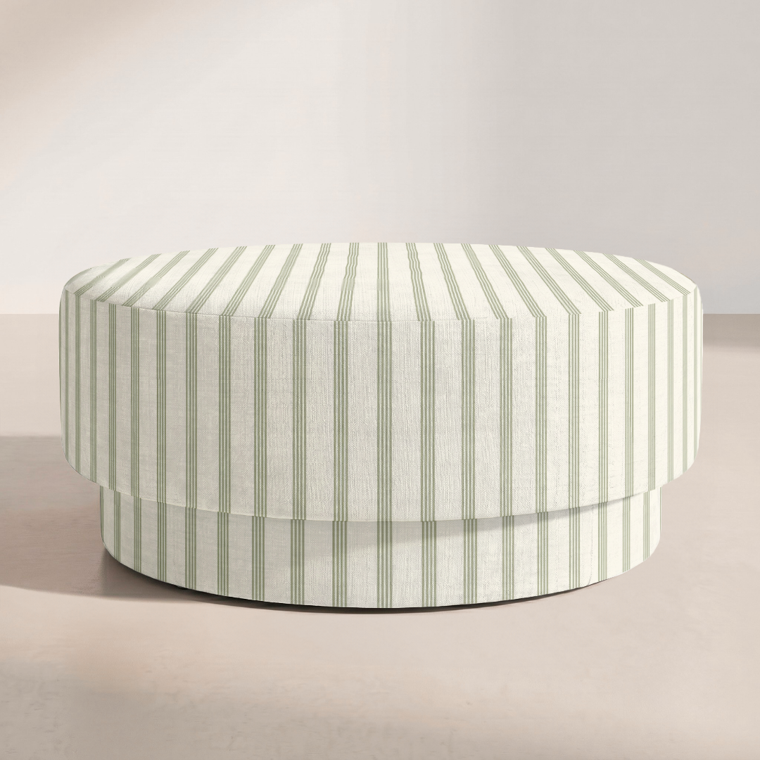 The Adelaide Ottoman in Orange County Olive Stripes