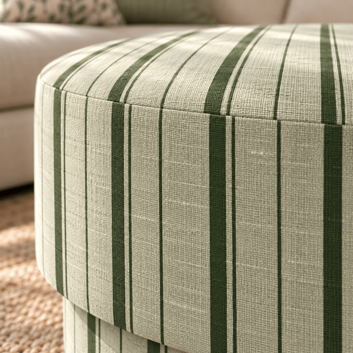 The Adelaide Ottoman in The Silk Garden Sage Stripes - Lemon Park